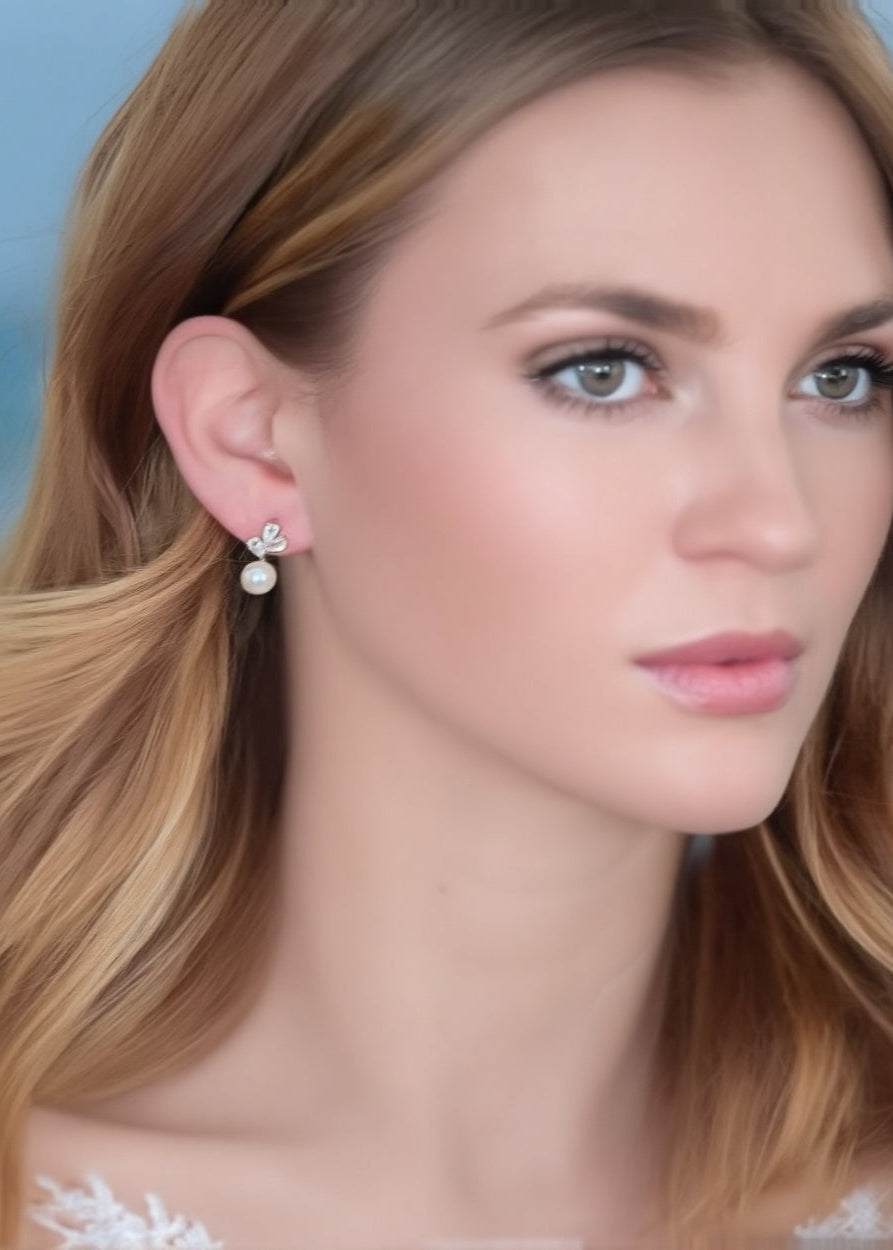 Pearl Wing Studs